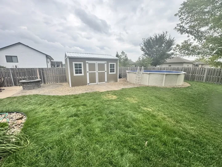 Backyard Shed & Poolside Landscaping